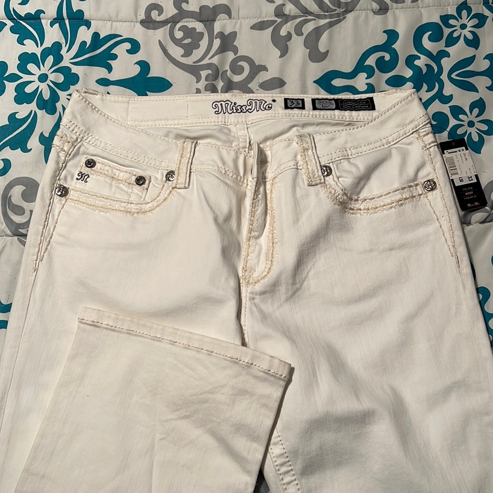 White boot cut miss me jeans